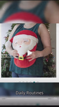 Woman holding a 5-inch Nick Santa Claus Squishmallow plush toy, perfect for holiday decorations and gifting.